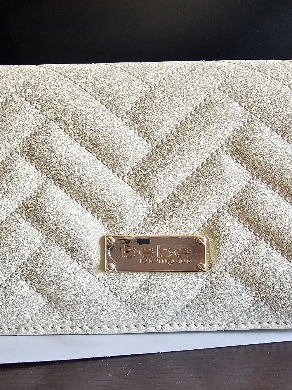 bebe Quilted Cream Envelope Clutch with Gold Plaque